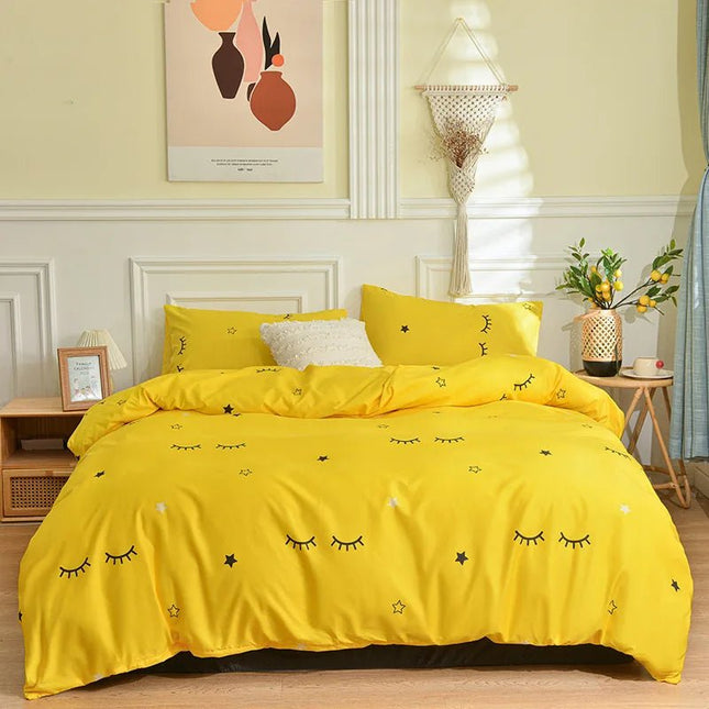 Parure de lit jaune à motifs cils et étoiles 150x200 cm – 4 pièces en
