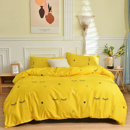 Parure de lit jaune à motifs cils et étoiles 200x230 cm – 4 pièces en